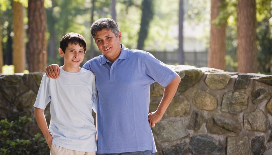 Young boy with his father.