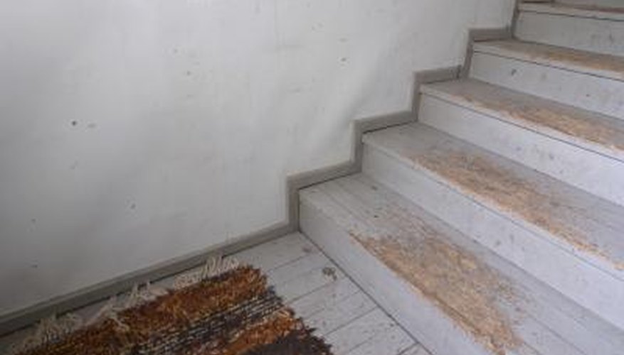 Protecting stairs with carpet involves finishing the edges.