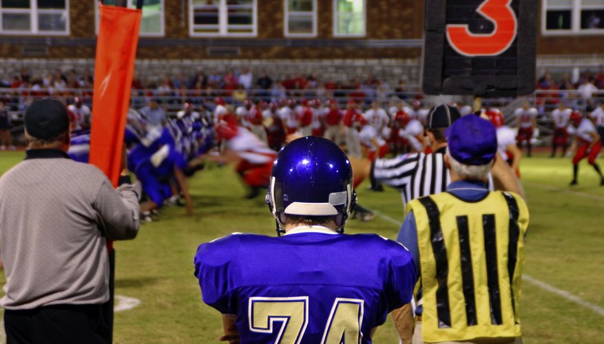 Wide shot of a college football game