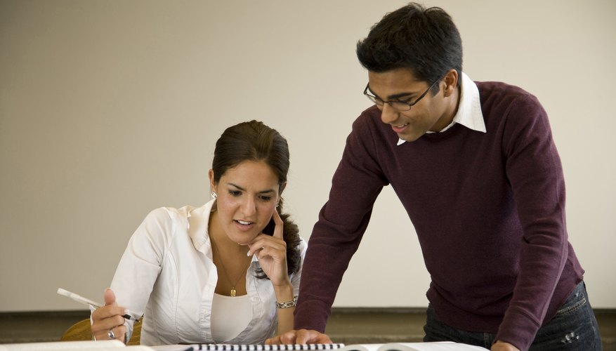 College students are writing papers.