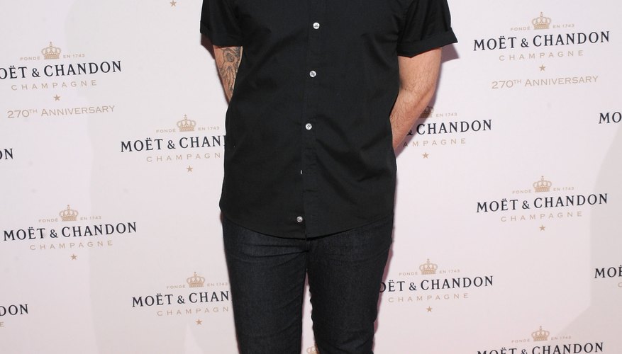 For hipster style, you can't go wrong with skinny jeans and a tight-fitting shirt, the choice of fashion designer Christian Siriano at an event in New York in August 2013.