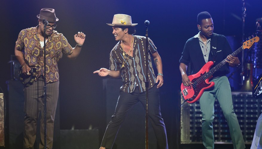 Bruno Mars goes sans socks in his loafers at the iHeartRadio festival.