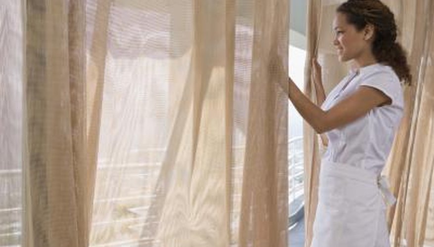 Drapes provide privacy and help block out sunlight.