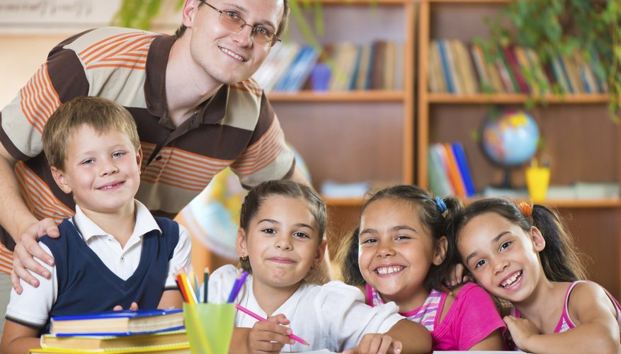 Teacher smiling with young students
