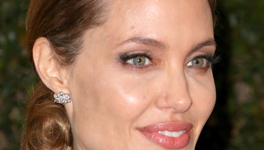 Angelina Jolie poses for photographers at Hollywood event in 2013.