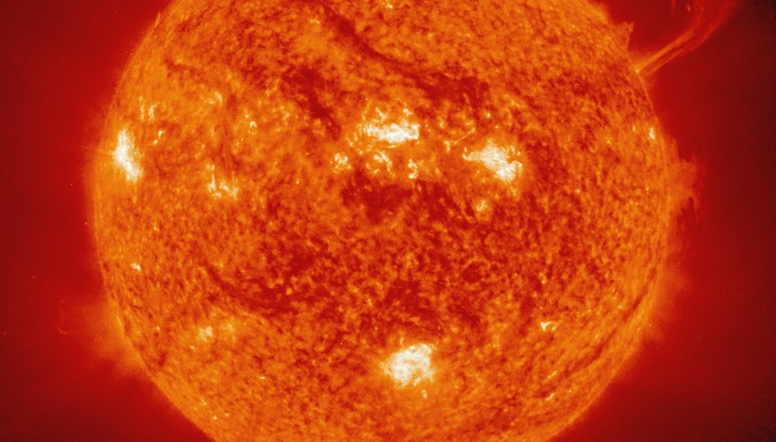 the sun is mostly made up of which two gases