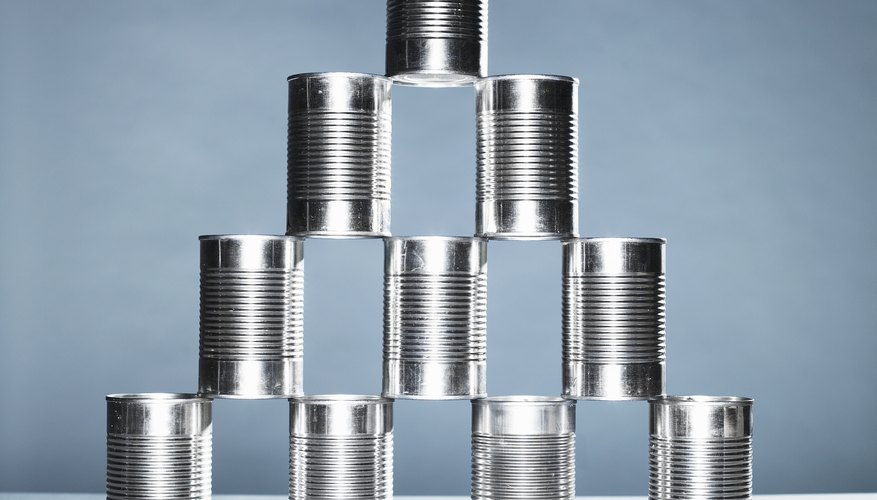 The Science Behind Why Some Foods Are Canned In Tin Vs. Aluminum