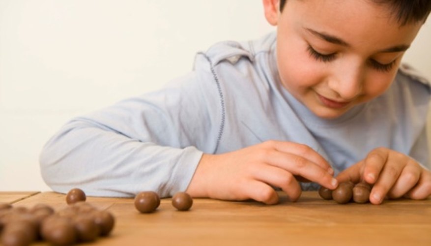 Make counting fun by setting up small games for your child.