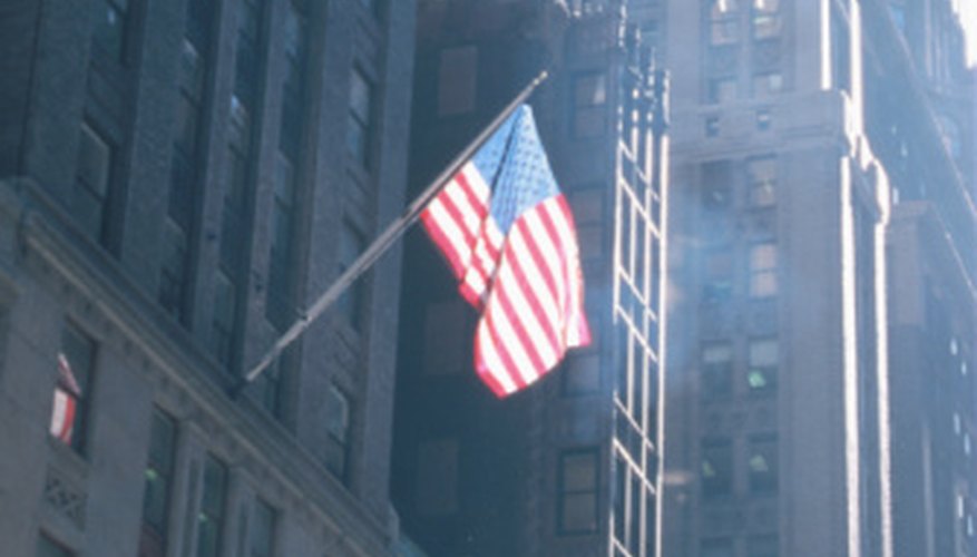 The union of the U.S. Flag should be at the peak of the staff.