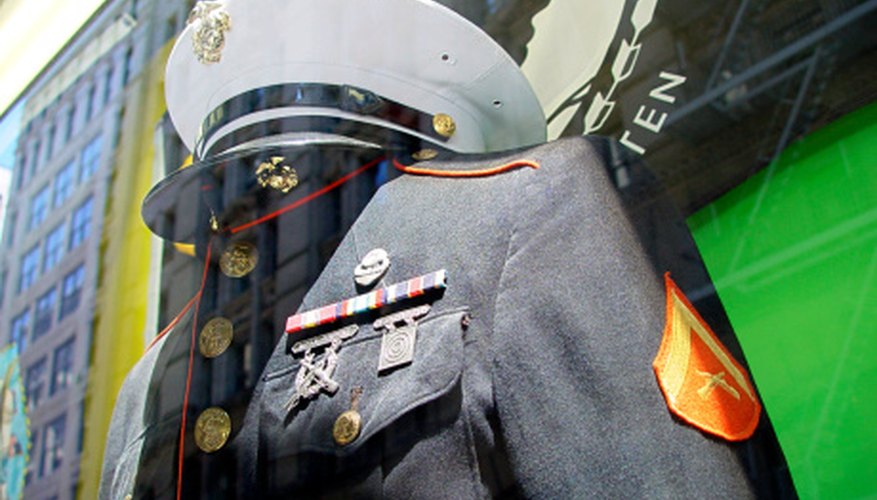 Marine corps uniforms have a distinct red stripe and gold buttons.
