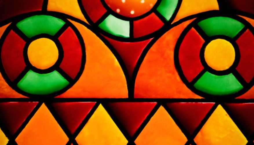 Create a stained-glass look with bits of colored paper and glue.