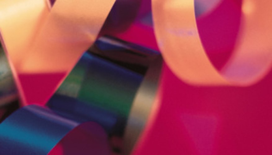 Make a bracelet using colorful ribbon.