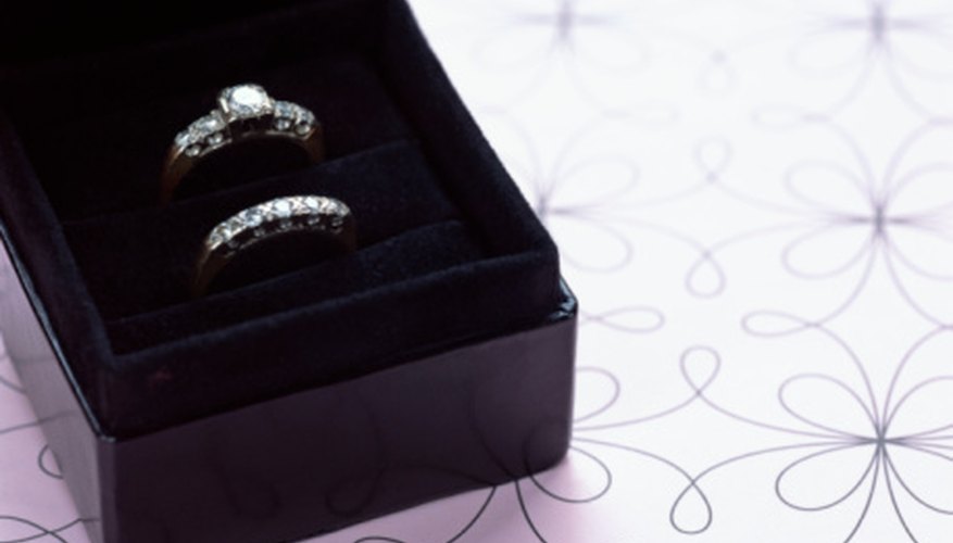Find a dual pocket wedding box so both rings can be stored together.