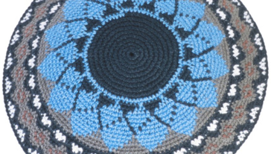A variety of patterns may appear on a yarmulke.
