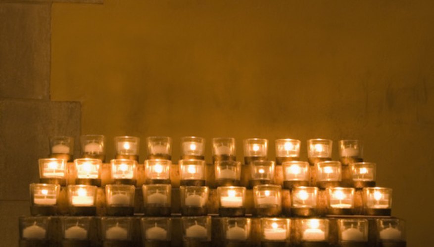 A table of votive candles.