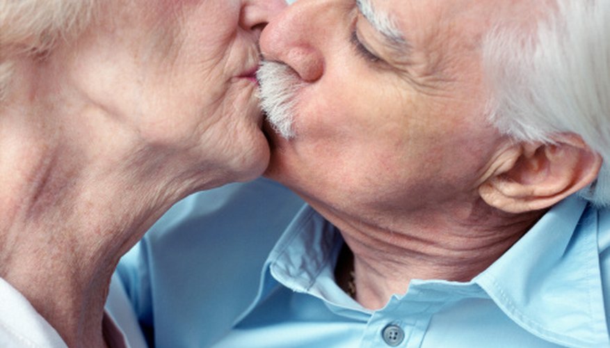 Learning how to kiss while wearing dentures may take a little practice.