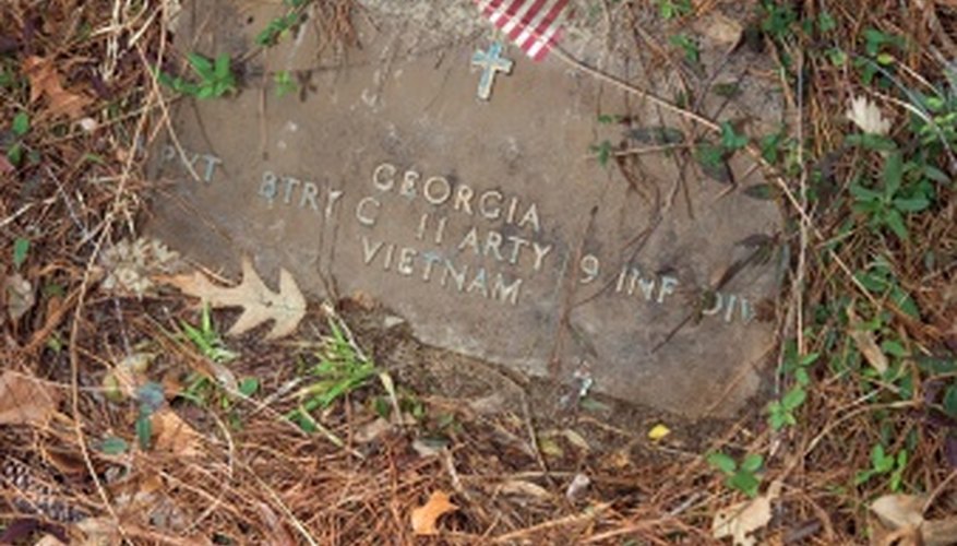 Some older cemeteries create concrete lips over flat markers for flags.