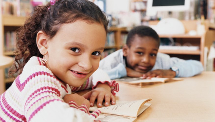 Children read independently in guided reading sessions.