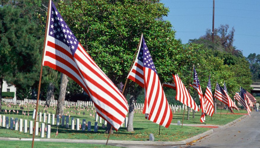 Flags are given positions of honor in military veteran's cemeteries.