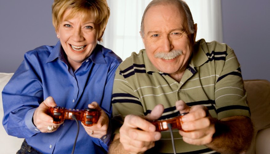 Senior adults enjoy age-appropriate video games.