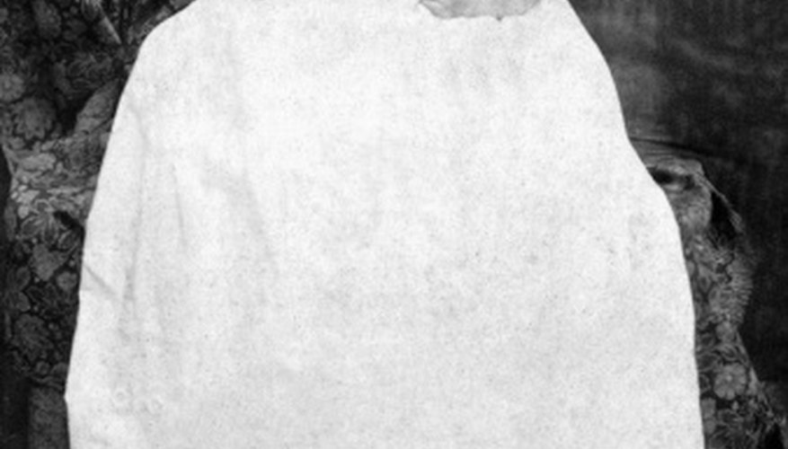 Both boys and girls often wear long white christening gowns when being baptized.