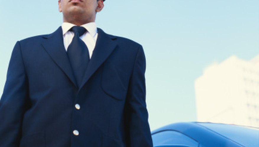 A chauffeur uniform may include a low-key hat.