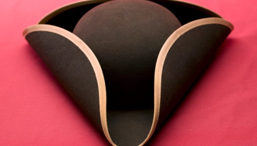 Tricorn hats were worn by both the Patriots and the British during the Revolutionary War period.
