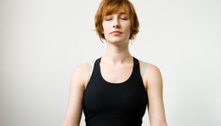 Relax your body as you concentrate on breathing deeply and smoothly.