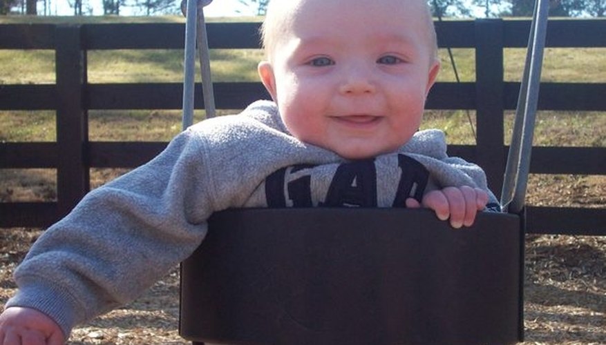 Babies in swings should never be more than an arm's length away from a parent.