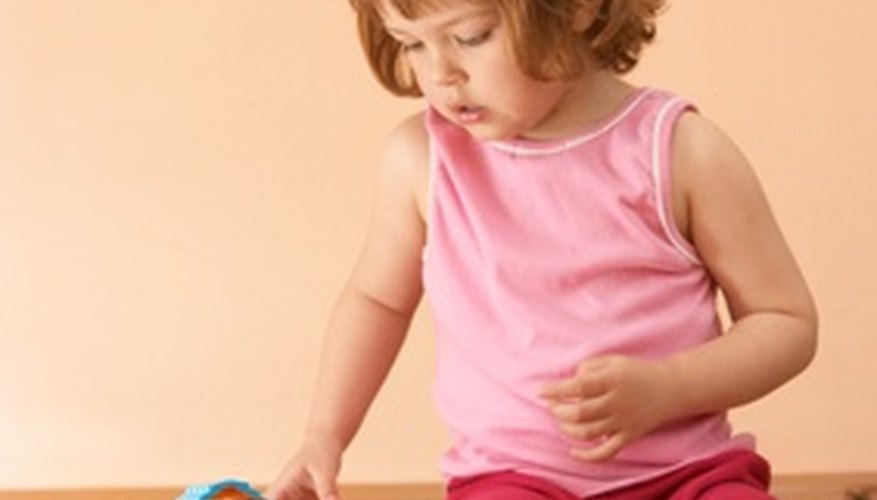 Use different and exciting objects during floor play.