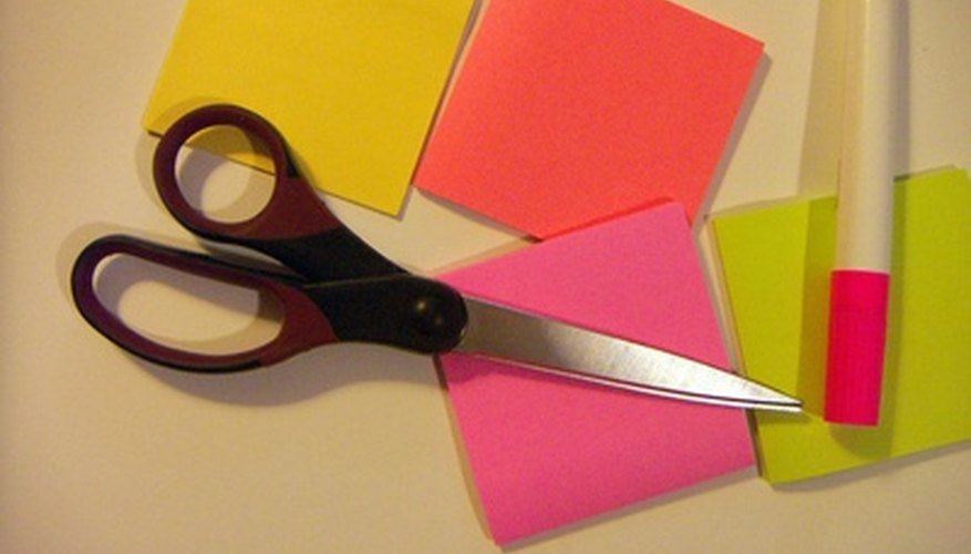 Low-tech equipment such as colored sticky notes can help students with visual impairments stay organized.