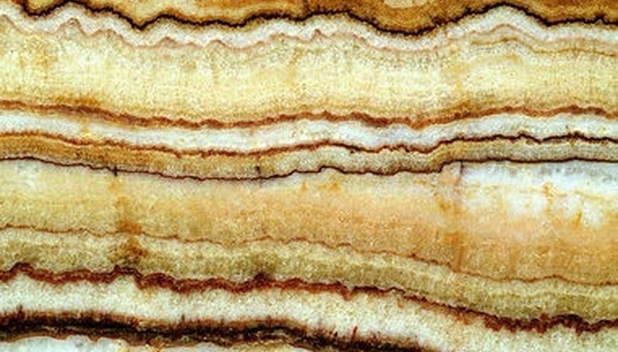 Stratigraphy relies upon fossil presence in layers of the Earth's crust to give them a date. Stratigraphy relies upon fossil presence in layers of the Earth's crust to give them a date.