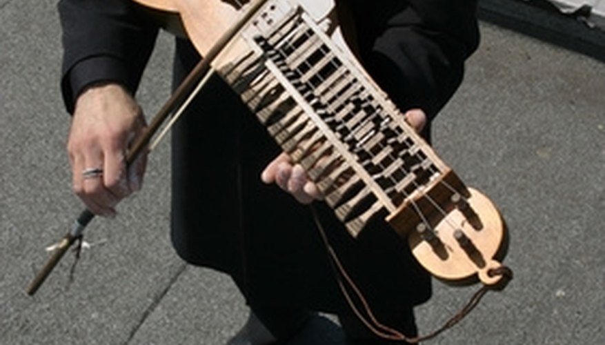 Photo Credit: musician image by Jorge Casais from <a href= The frequencies produced by musical instruments contain harmonics