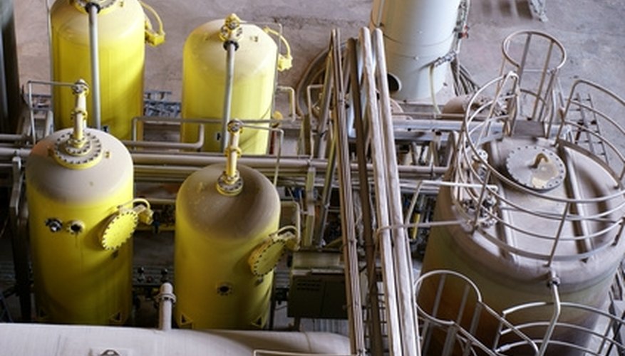 Photo Credit: Water treatment plant image by Andrei Merkulov from <a href='http://www.fotolia.com'>Fotolia.com</a> Water treatment removes unwanted chemicals and microorganisms from water.