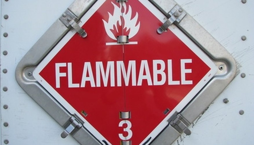 Photo Credit: flammable class 3 placard image by k9dg from <a href='http://www.fotolia.com'>Fotolia.com</a> Hydrogen in its gas form is highly flammable.