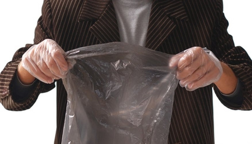 Photo Credit: Garbage bag image by Mykola Velychko from <a href='http://www.fotolia.com'>Fotolia.com</a> Some garbage bags are much stronger than others.