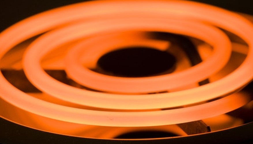 Photo Credit: Close-up image of an electric range heating element image by Alexey Stiop from <a href='http://www.fotolia.com'>Fotolia.com</a> Heating a magnet to the Curie temperature will deteriorate its magnetic properties.