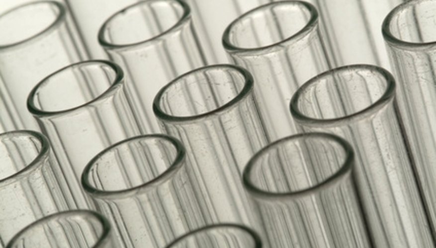Photo Credit: Verrerie de laboratoire. image by Photon BLEU from <a href='http://www.fotolia.com'>Fotolia.com</a> By separating a mixture of sand and salt, you demonstrate the chemical properties of solubility and insolubility in water.