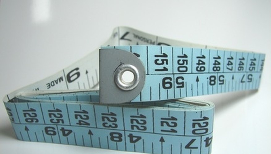 Photo Credit: measure image by vashistha pathak from <a href='http://www.fotolia.com'>Fotolia.com</a> Feet can be converted to meters by using multiplication.