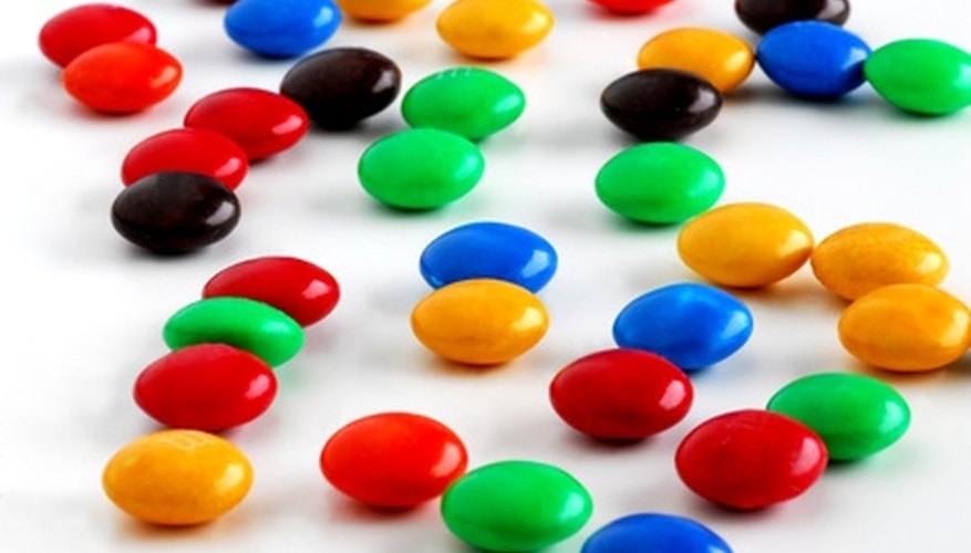 Photo Credit: candy image by saied shahinkiya from <a href='http://www.fotolia.com'>Fotolia.com</a> M&Ms can be used to help children learn math.