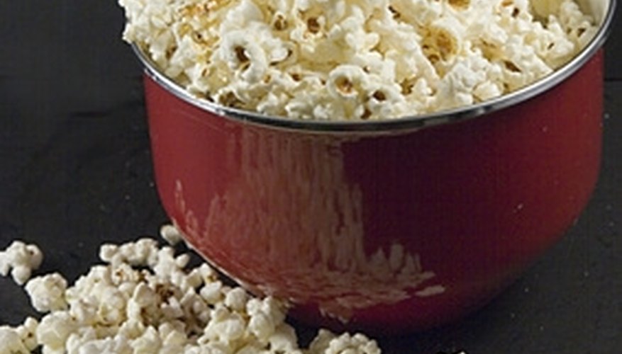 Photo Credit: popcorn image by Photoeyes from <a href='http://www.fotolia.com'>Fotolia.com</a> Popcorn offers fun science project ideas.