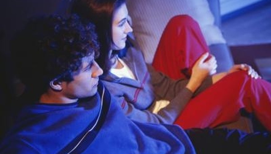 Another couple can make you feel comfortable watching a movie with your sweetheart. Another couple can make you feel comfortable watching a movie with your sweetheart.