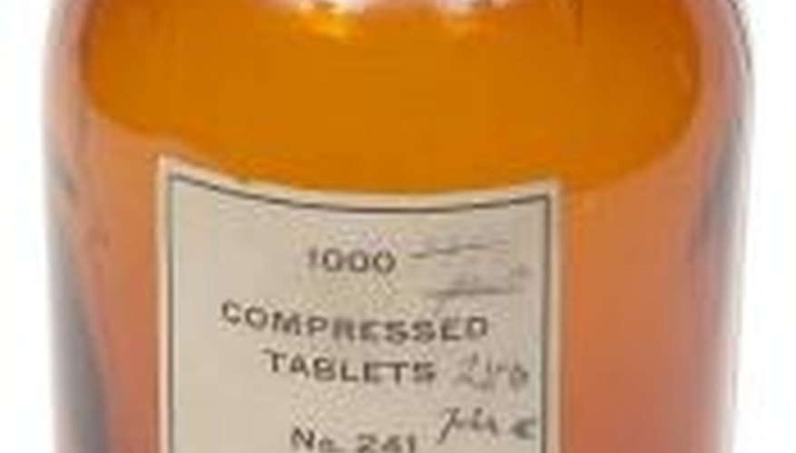 Photo Credit: Hemera Technologies/PhotoObjects.net/Getty Images A bottle of gastric alkaline.