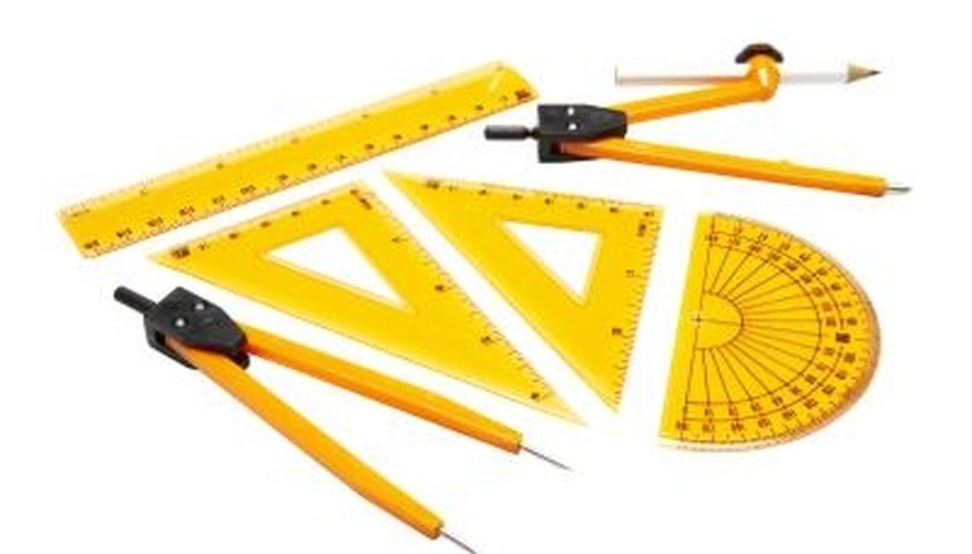 Photo Credit: Thomas Northcut/Photodisc/Getty Images Basic drafting tools including compasses, squares, a protractor and a ruler.