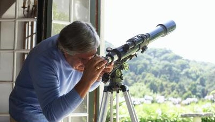 Photo Credit: Roger Weber/Digital Vision/Getty Images Increase the magnification of your telescope using eyepieces or a Barlow lens.