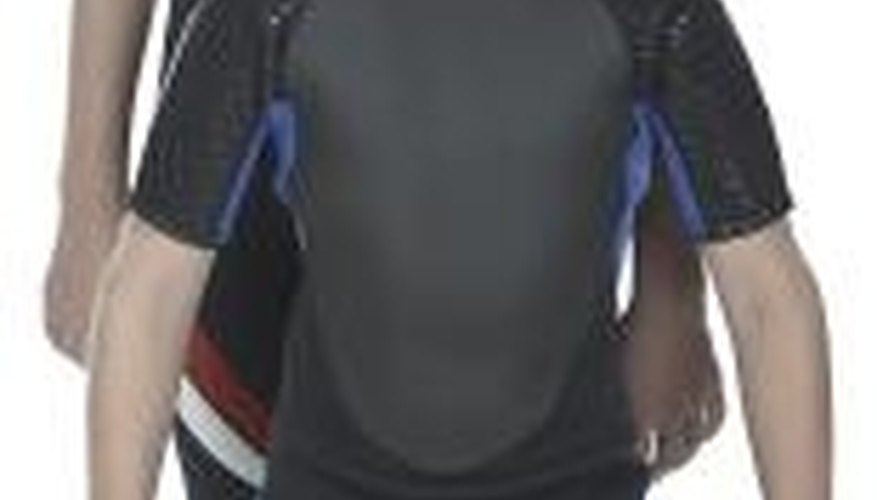 Photo Credit: Photos.com/PhotoObjects.net/Getty Images The neoprene in a wet suit is made from a polymerization reaction.