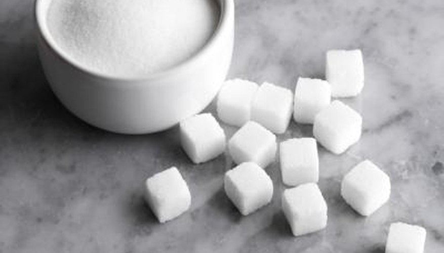 Photo Credit: Polka Dot Images/Polka Dot/Getty Images Table sugar, or sucrose, is made up of two smaller sugar molecules, glucose and fructose.