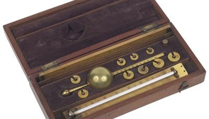 Photo Credit: Hemera Technologies/PhotoObjects.net/Getty Images Analog barometers use mercury and gauges with no digital display.