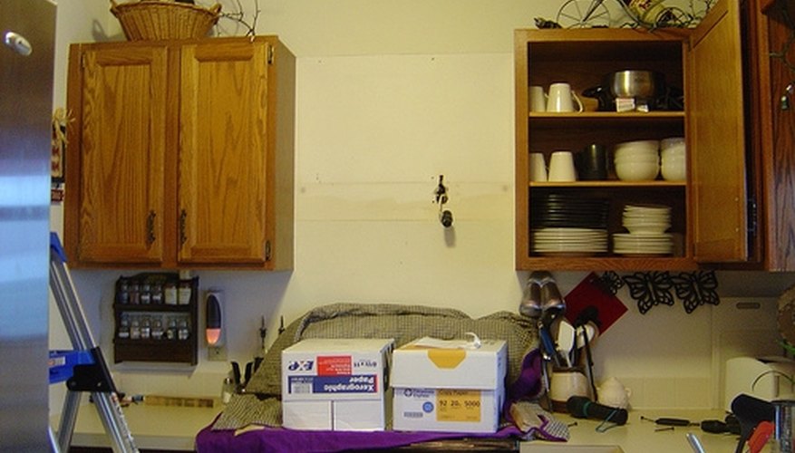 Remove cabinets on top. Remove cabinets on top.