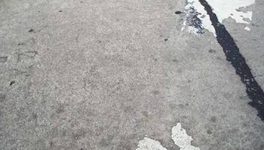 This garage floor needs covering. This garage floor needs covering.